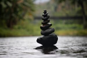 pebbles, balanced pebbles, water